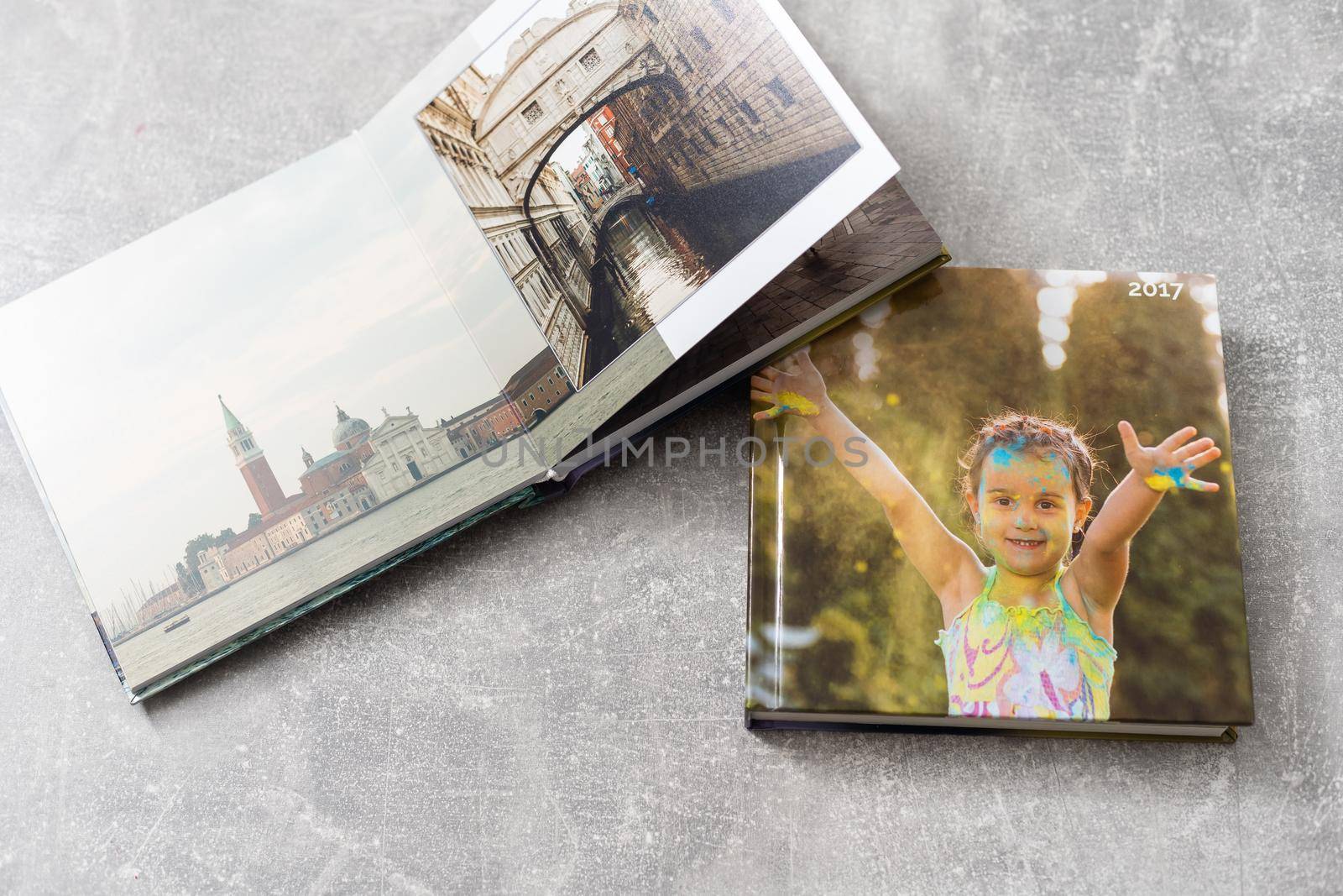 Photobook Album with Travel Photo on Table.