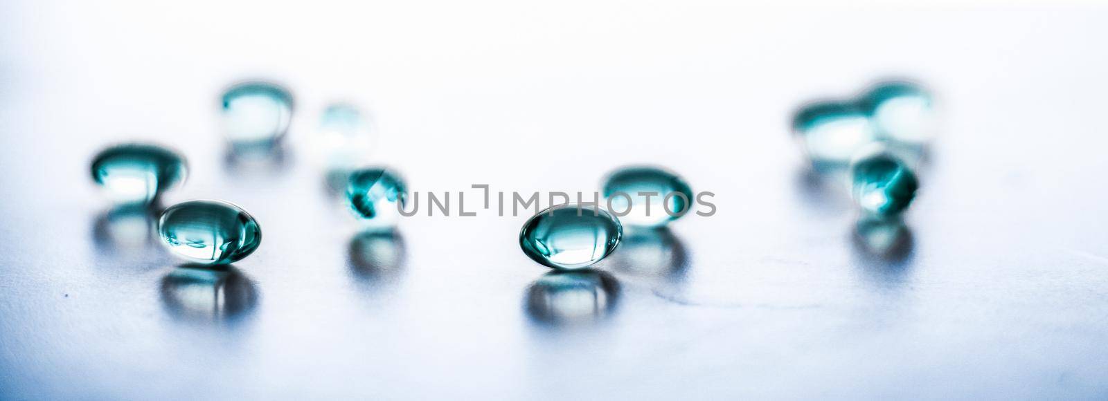 Pharmaceutical, branding and science concept - Blue pills for healthy diet nutrition, supplements pill and probiotics capsules, healthcare and medicine as pharmacy and scientific research background