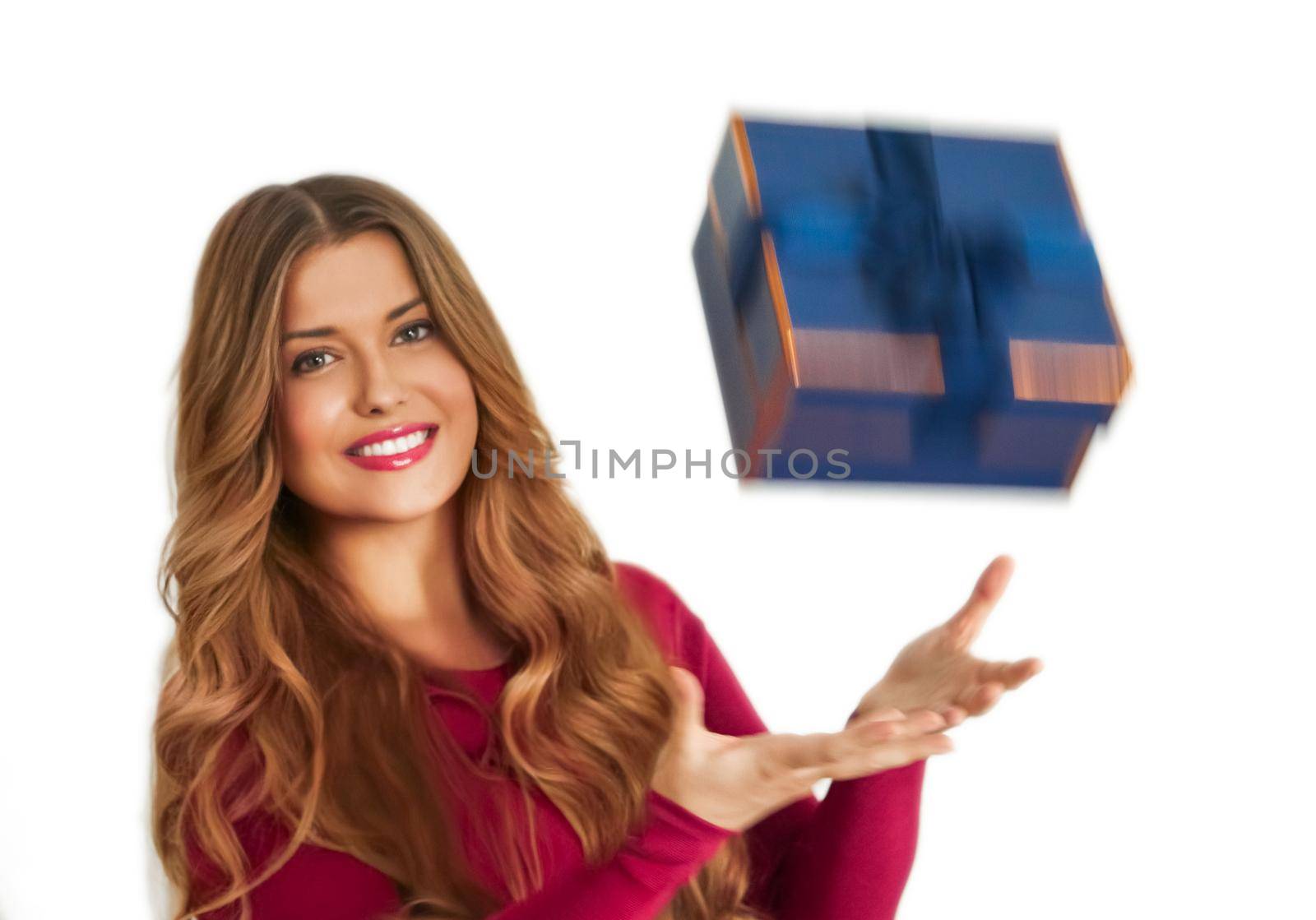 Birthday, Christmas or holiday present, happy woman holding a blue gift or luxury beauty box subscription delivery isolated on white background, portrait