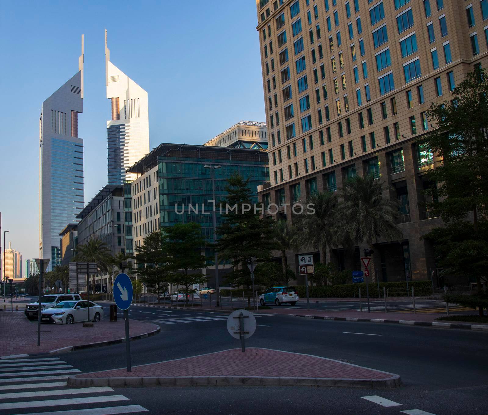 Dubai Financial Center road. Landmarks such Jumeirah Emirates towers, Ritz Carlton, DIFC on the picture. Outdoors