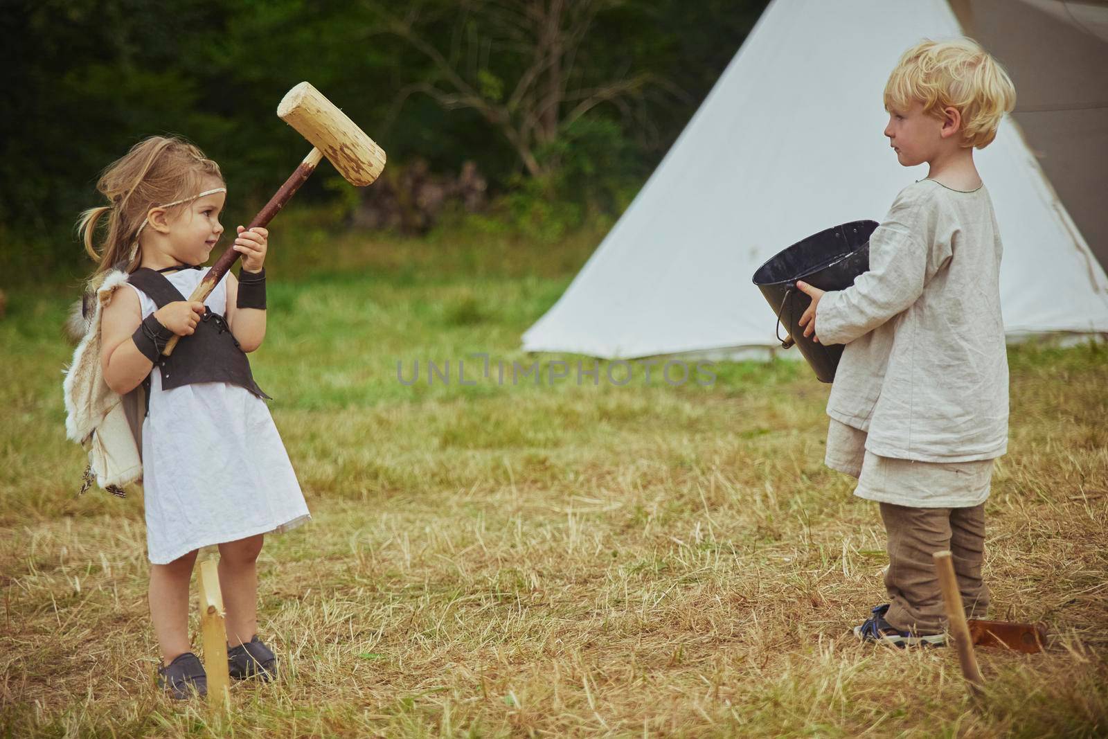 Hojbjerg, Denmark, August, 2022: Children playing at viking festival by Viktor_Osypenko
