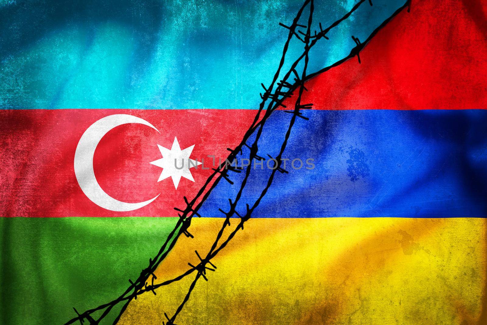 Grunge flags of Azerbaijan and Armenia divided by barb wire illustration, concept of tense relations between two countries