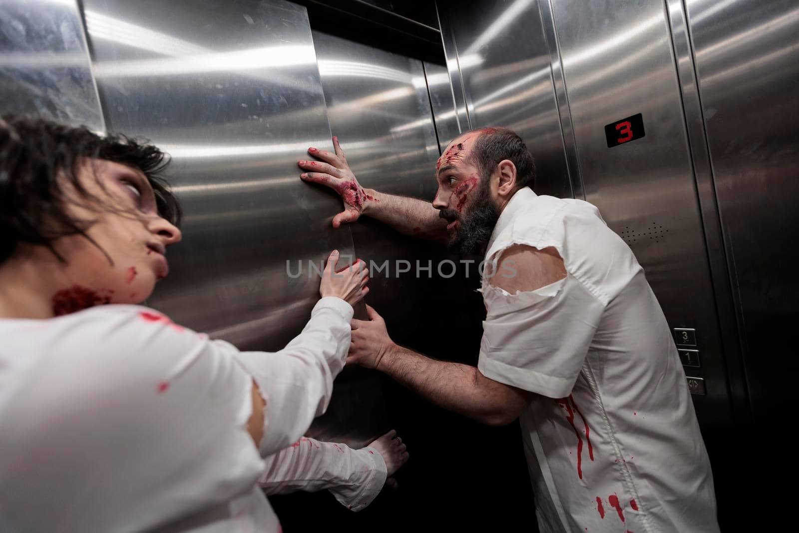 Brain eating monsters crawling in elevator by DCStudio