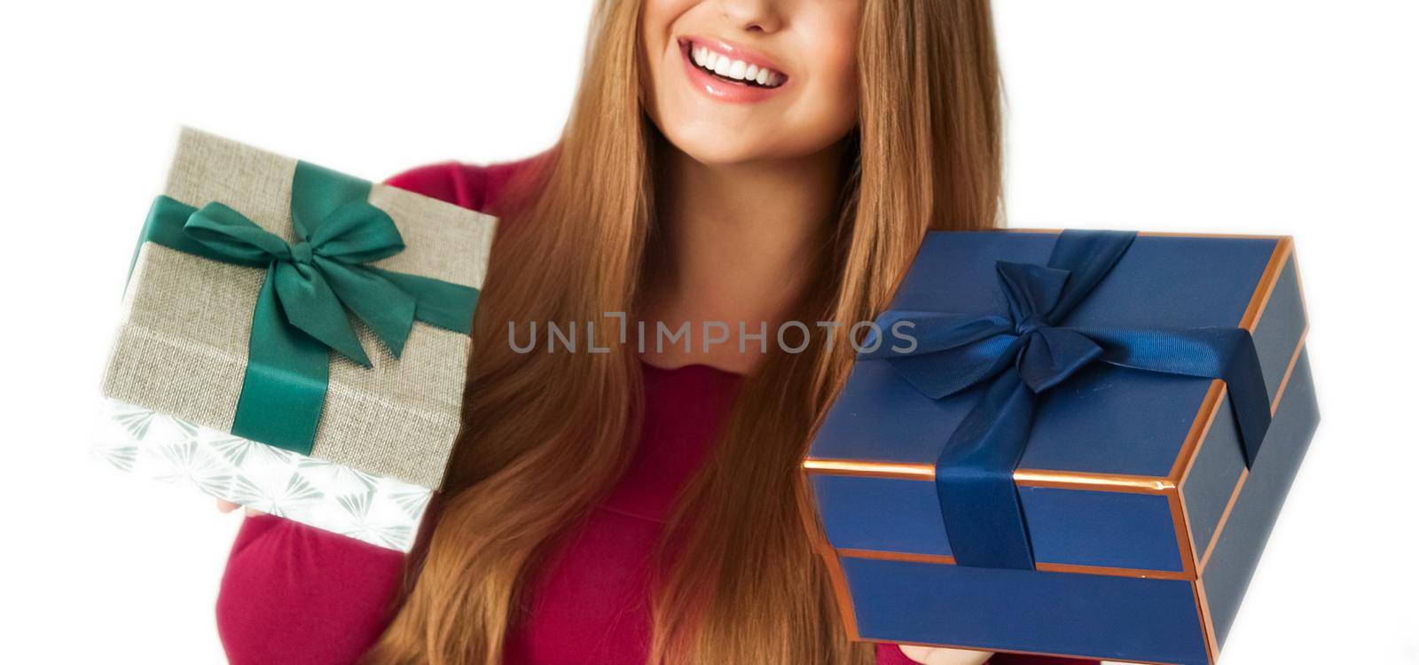 Birthday, Christmas gifts or holiday present, happy woman holding gift boxes isolated on white background by Anneleven