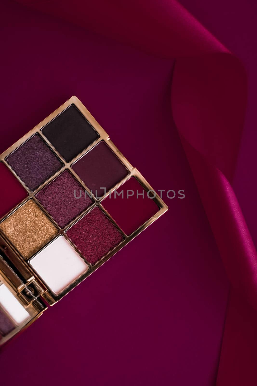 Eyeshadow palette and make-up brush on wine background, eye shadows cosmetics product for luxury beauty brand promotion and holiday fashion blog design by Anneleven