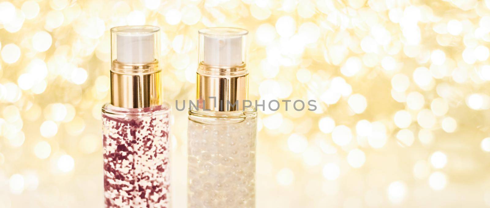 Cosmetic branding, blank label and glamour present concept - Holiday make-up base gel, serum emulsion, lotion bottle and golden glitter, luxury skin and body care cosmetics for beauty brand ads