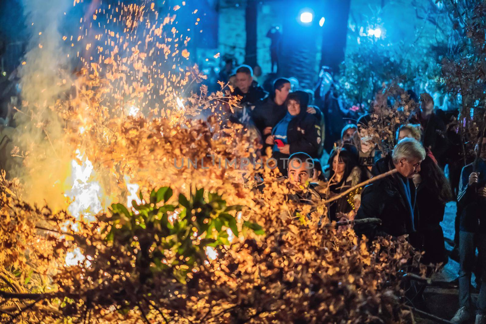 Montenegro, Budva 7.01. 2021: Christian Christmas in Montenegro, the feast of the oak branch. People burn an oak branch in honor of Christmas.