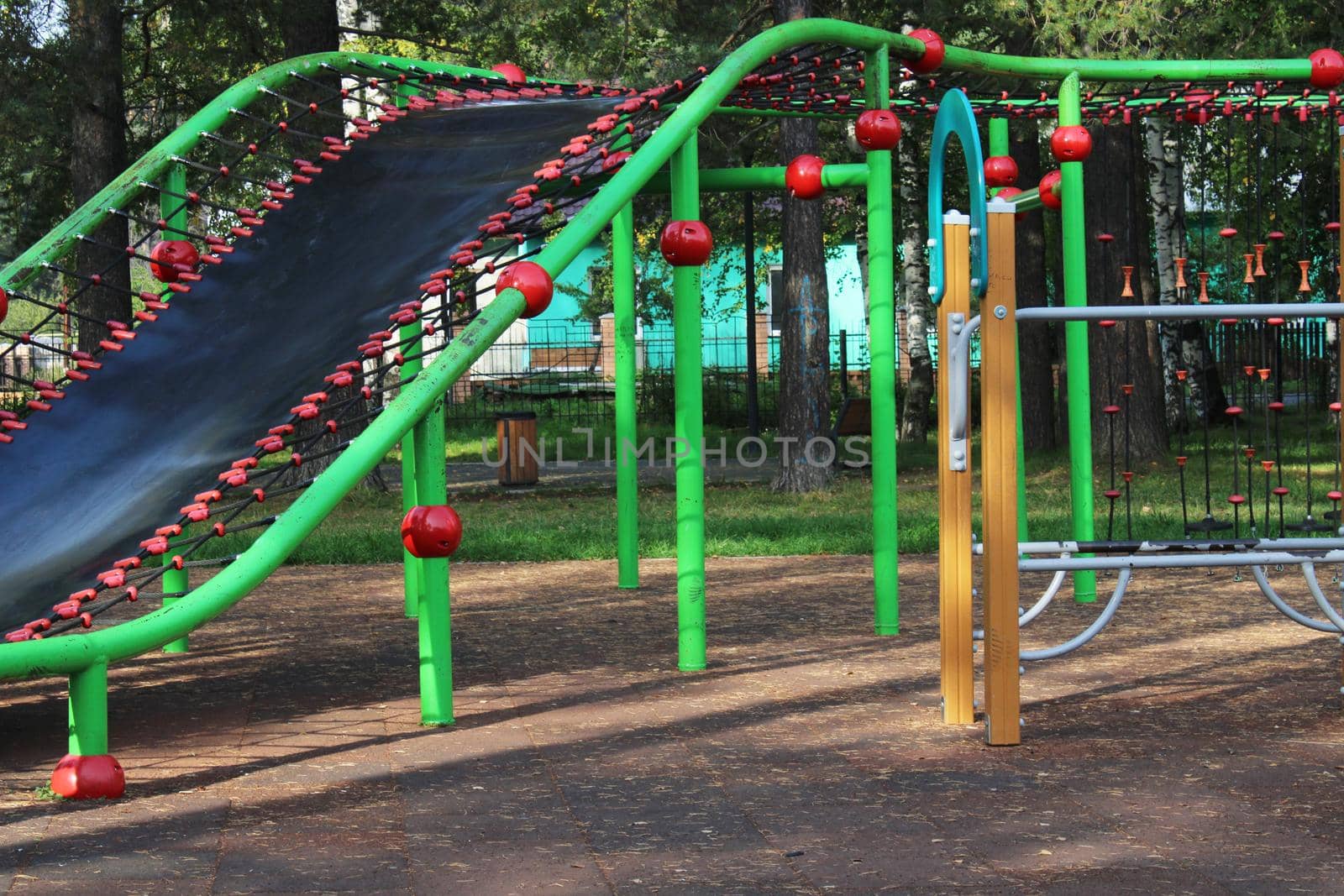 Children's playground with sports equipment in the city park. The concept of a healthy lifestyle.