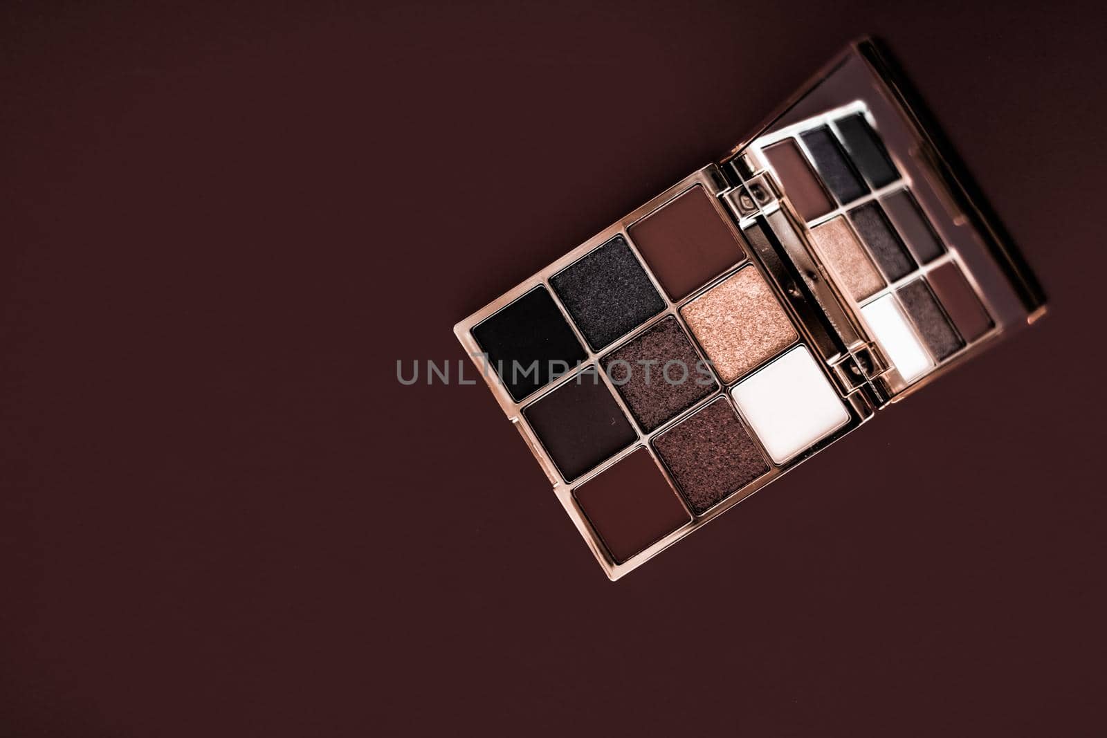 Eyeshadow palette and make-up brush on chocolate background, eye shadows cosmetics product for luxury beauty brand promotion and holiday fashion blog design by Anneleven
