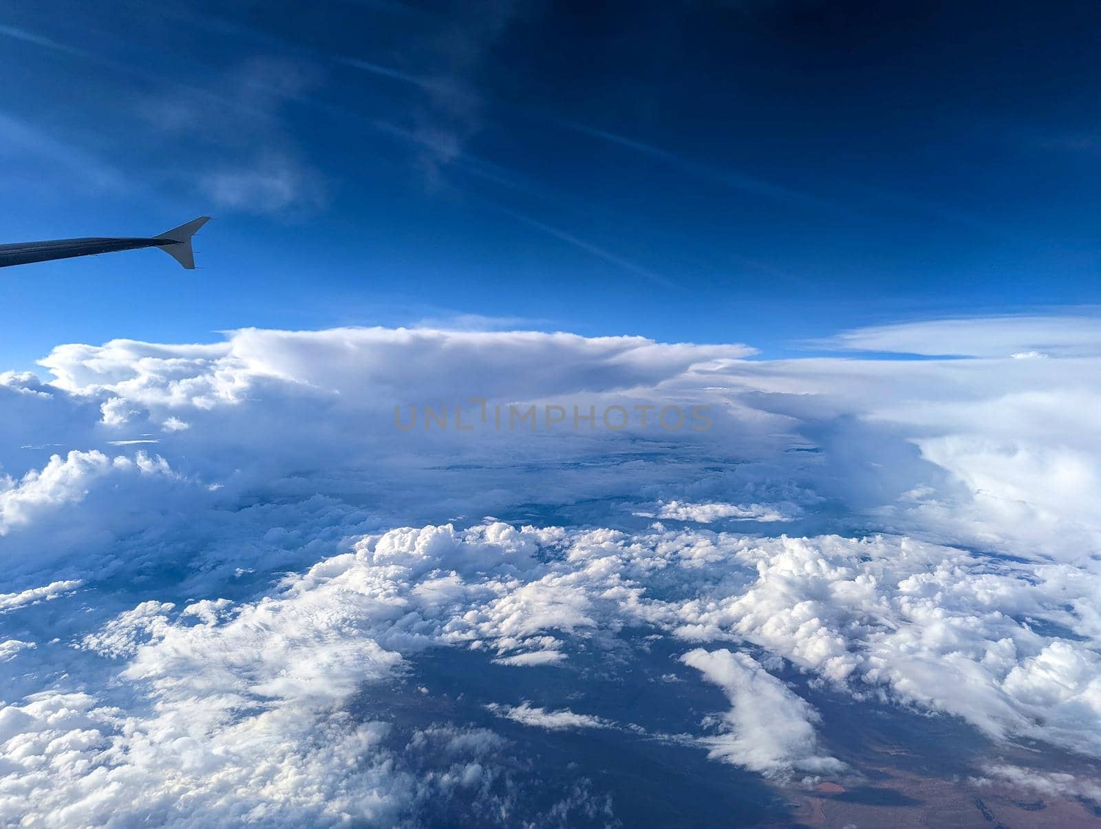 flying high in the sky with beautiful clouds