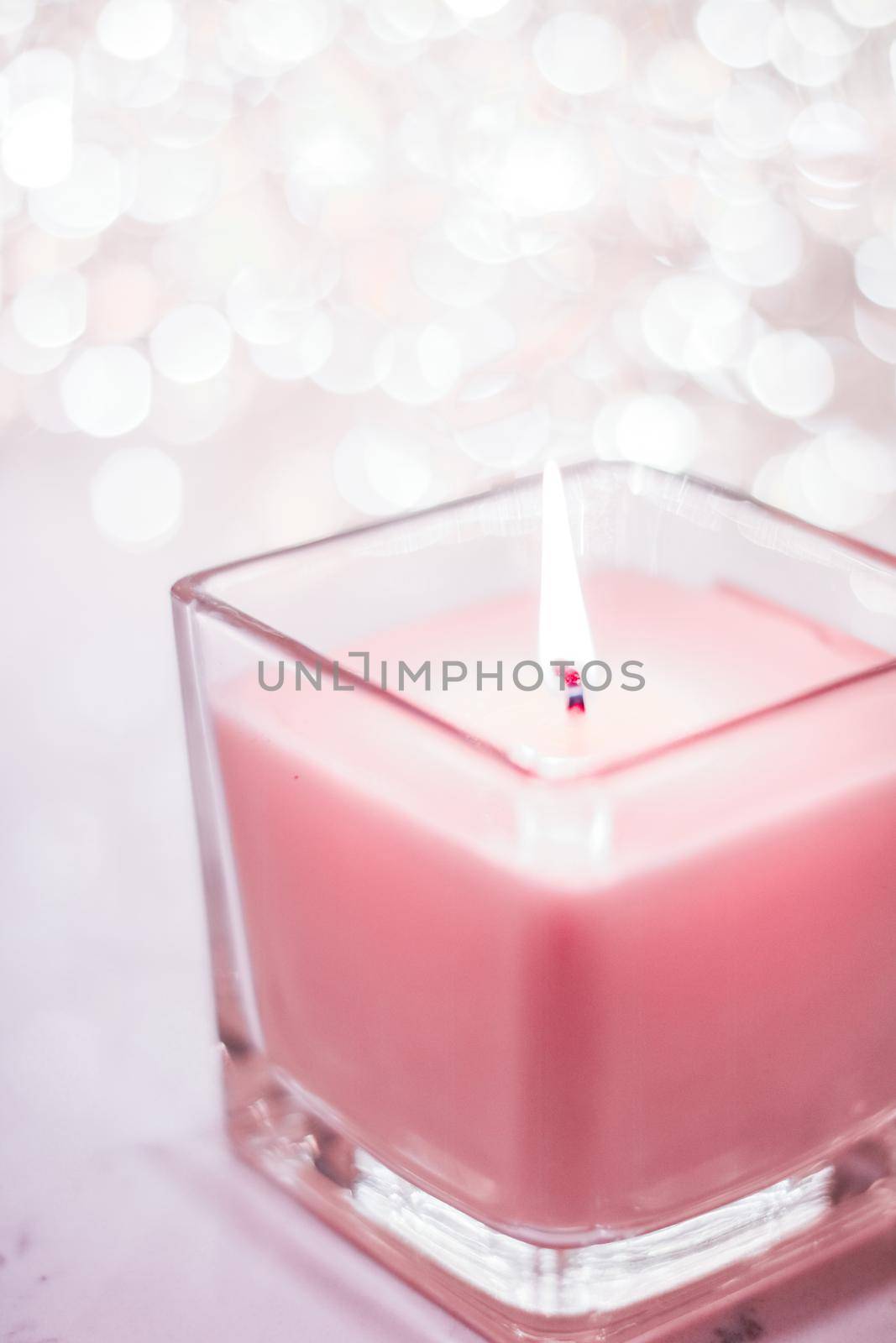 Festive decoration, branding and aromatherapy spa concept - Rose aromatic candle on Christmas and New Years glitter background, Valentines Day luxury home decor and holiday season brand design