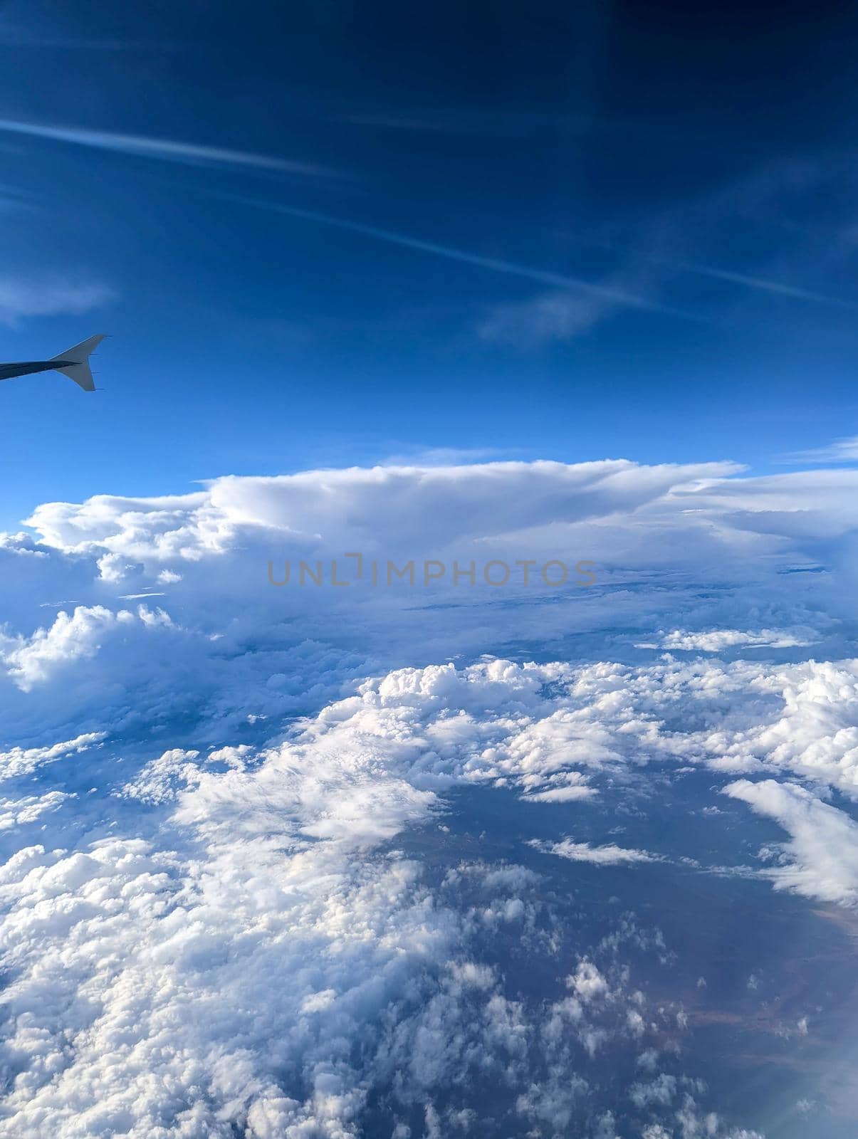flying high in the sky with beautiful clouds