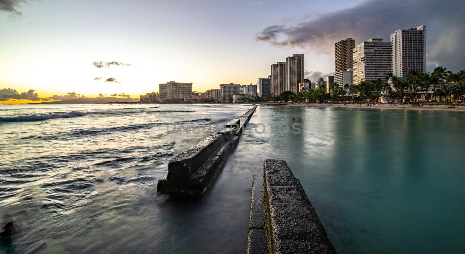 sunset at waikiki beach area in oahu hawaii by digidreamgrafix