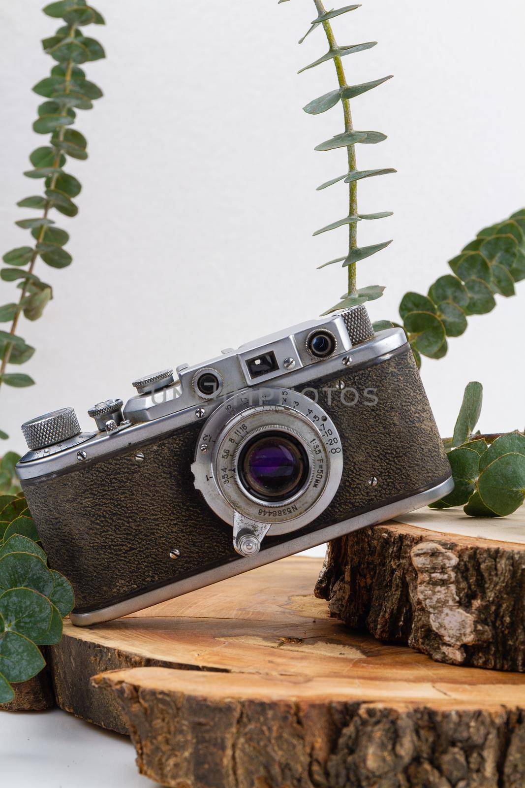 Old fashioned retro vintage photo camera close up. by super_picture