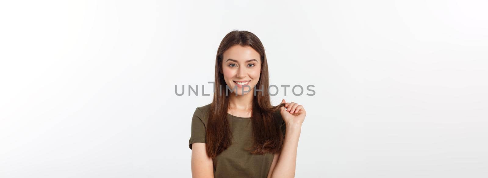 Close-up portrait of yong woman casual portrait in positive view, big smile, beautiful model posing in studio over white background. by Benzoix
