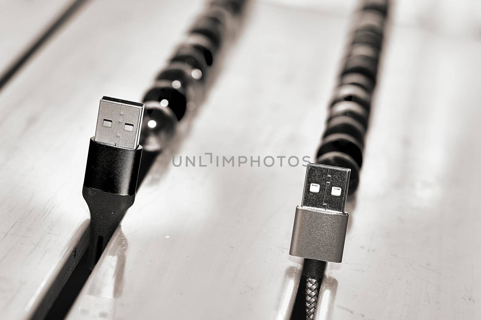 bring together or into contact so that a real or notional link is established. Connect and chat. Black and white usb cables and balloons