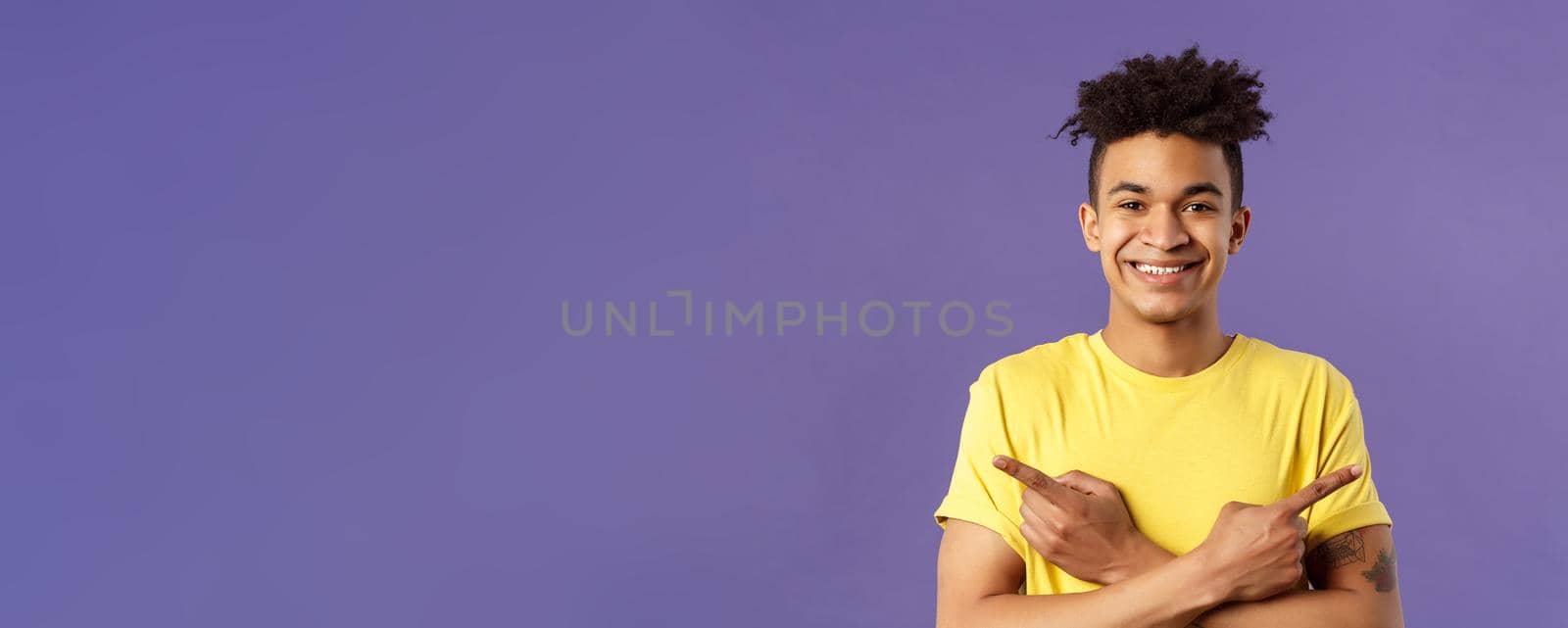 Close-up portrait of pleased, good-looking hispanic man promoting two products, showing both ways good, give variants, pointing fingers left and right, smiling recommend check out all by Benzoix