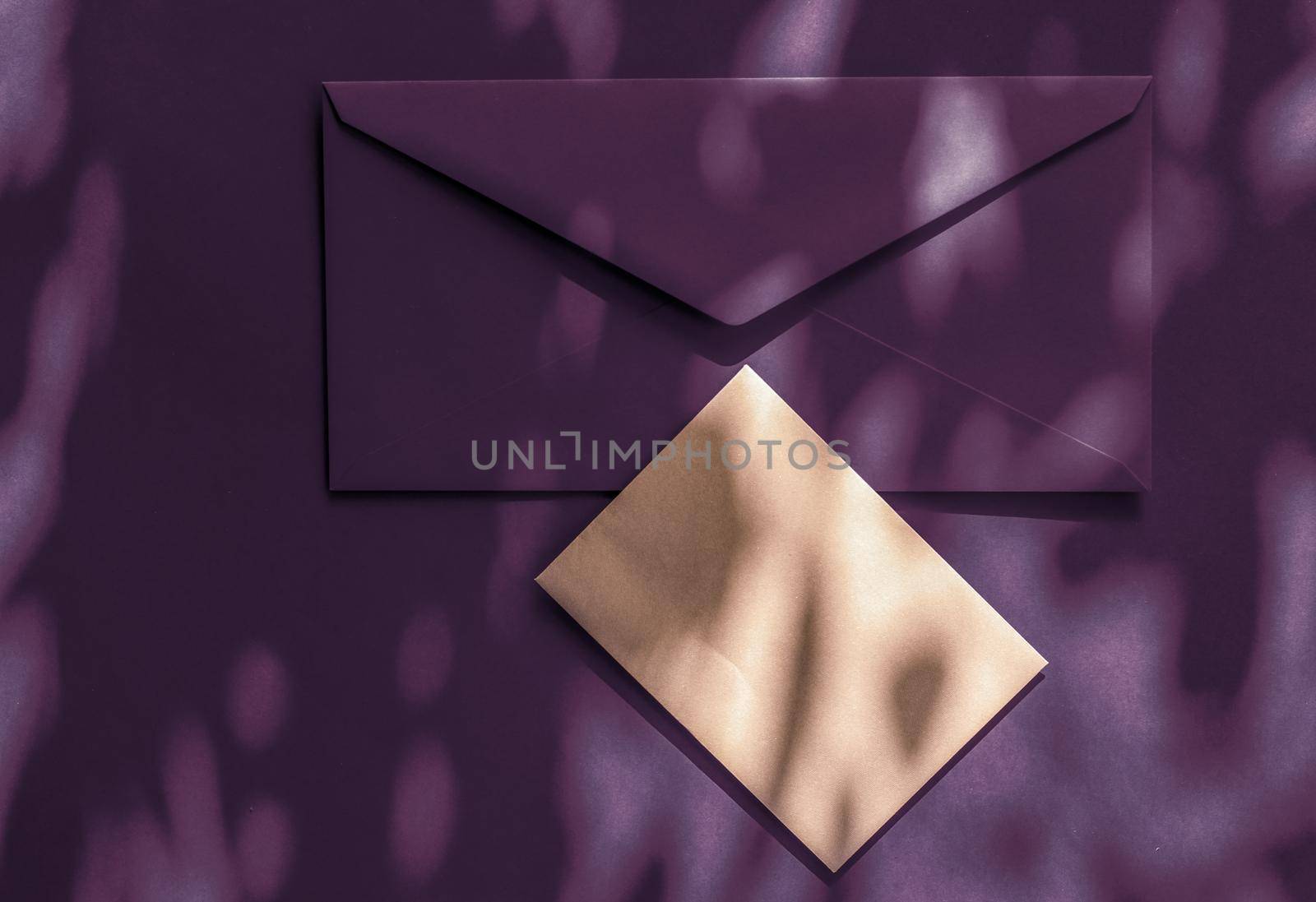 Holiday marketing, business kit and email newsletter concept - Beauty brand identity as flatlay mockup design, business card and letter for online luxury branding on plum shadow background