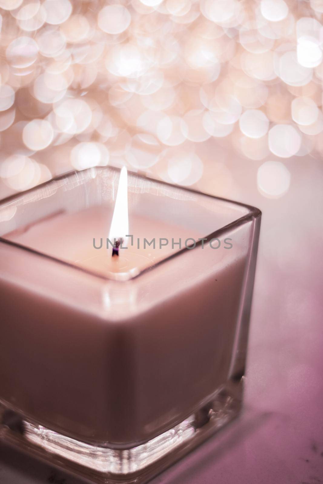 Festive decoration, branding and aromatherapy spa concept - Chocolate aromatic candle on Christmas and New Years glitter background, Valentines Day luxury home decor and holiday season brand design