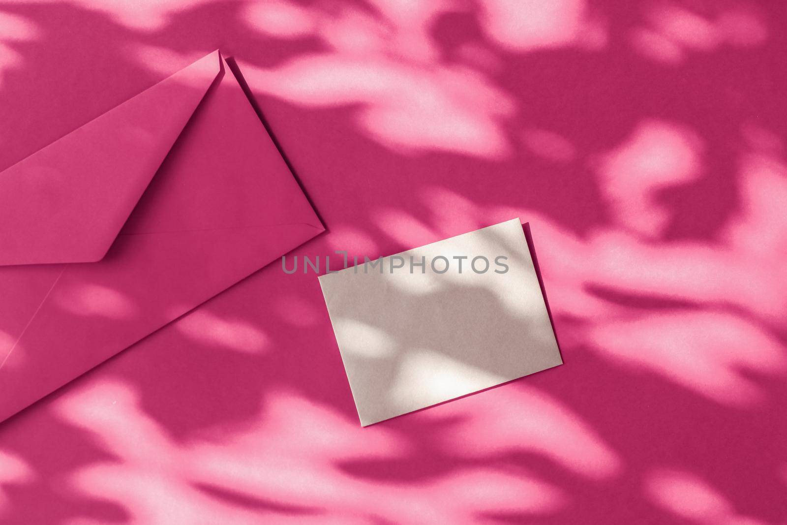 Holiday marketing, business kit and email newsletter concept - Beauty brand identity as flatlay mockup design, business card and letter for online luxury branding on pink shadow background