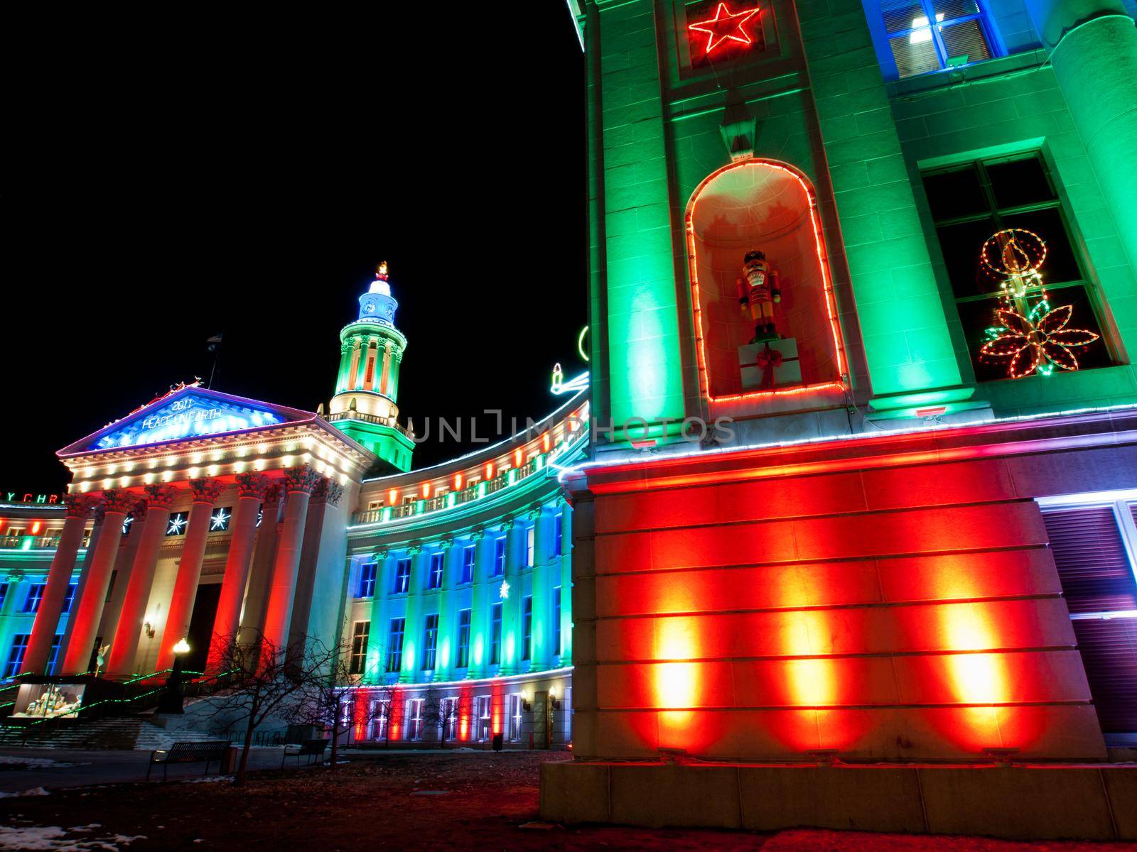 Downtown Denver at Christmas. Denver's City and County building decorated with holiday lights.