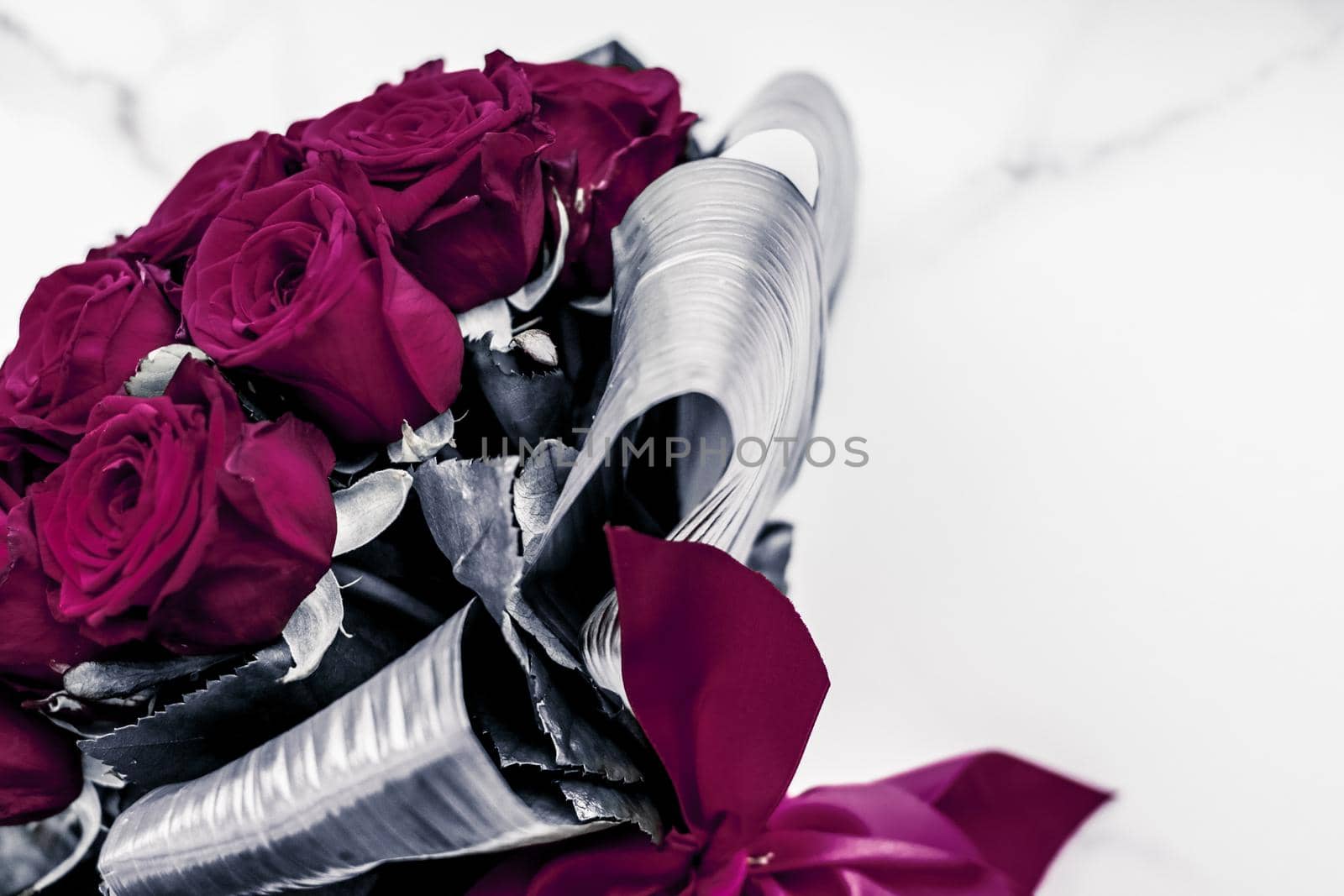 Gift for her, romantic relationship and floral design concept - Luxury bouquet of maroon roses on marble background, beautiful flowers as holiday love present on Valentines Day