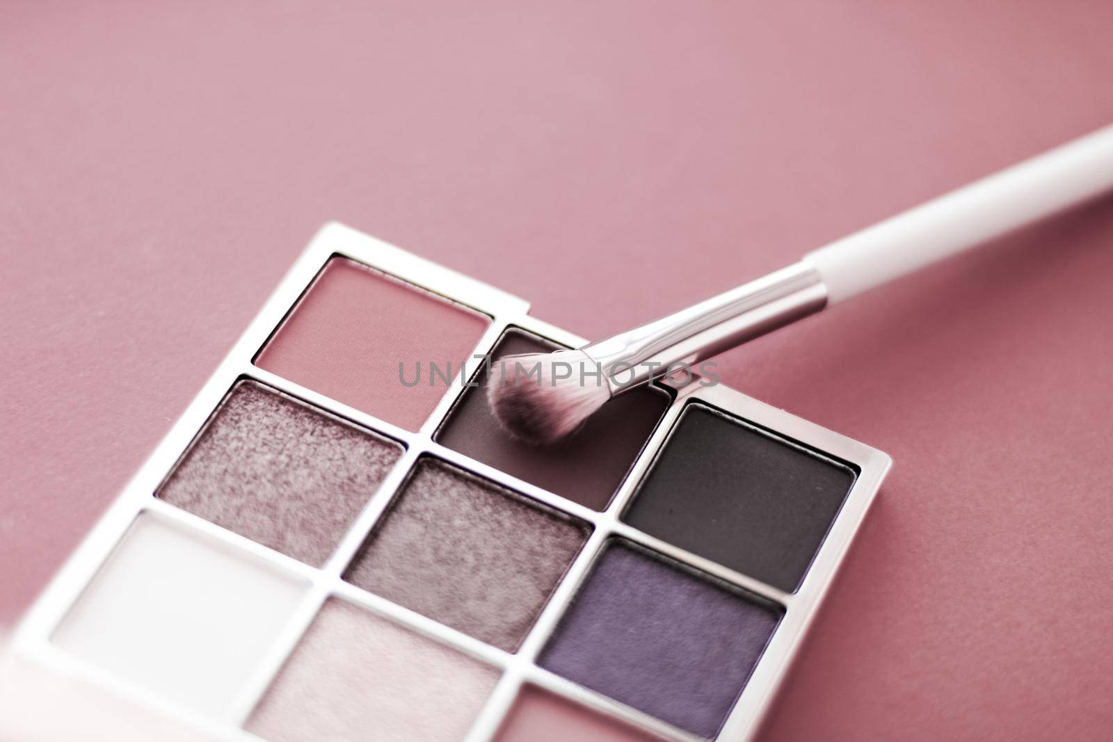 Cosmetic branding, mua and girly concept - Eyeshadow palette and make-up brush on rouge background, eye shadows cosmetics product for luxury beauty brand promotion and holiday fashion blog design