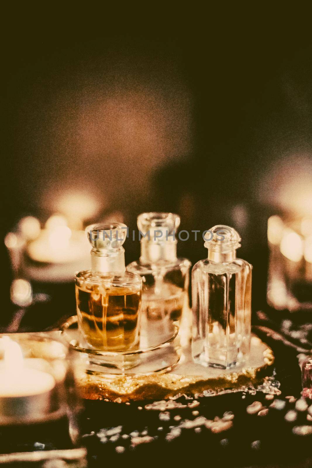 Perfumery, cosmetic branding and spa concept - Perfume bottles and vintage fragrance at night, aroma scent, fragrant cosmetics and eau de toilette as luxury beauty brand, holiday fashion parfum design