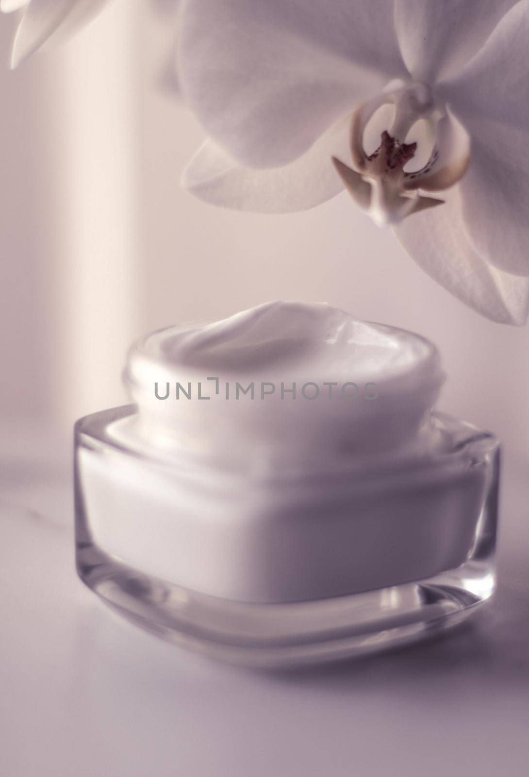 Cosmetic branding, toiletries and spf concept - Face cream moisturizer jar and orchid flower, moisturizing skin care lotion and lifting emulsion, anti-age cosmetics for luxury beauty skincare brand