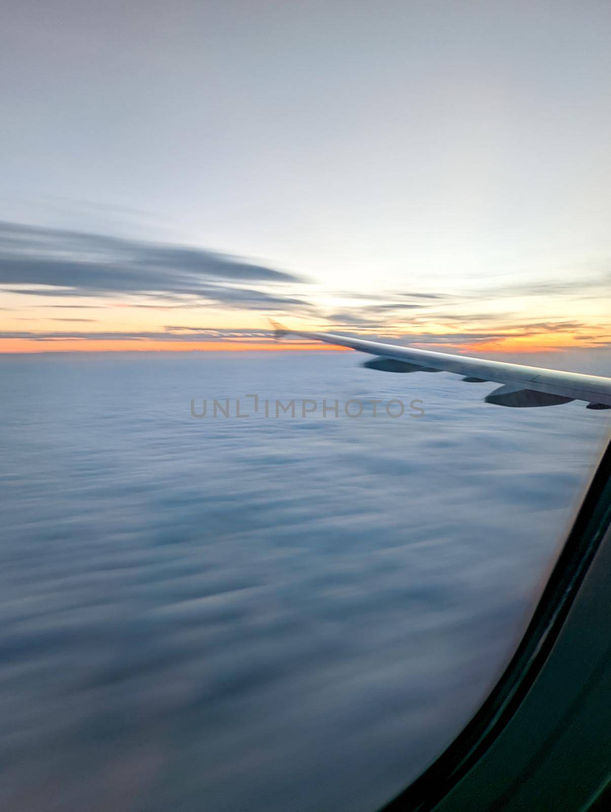 early morning sunrise from an airplane