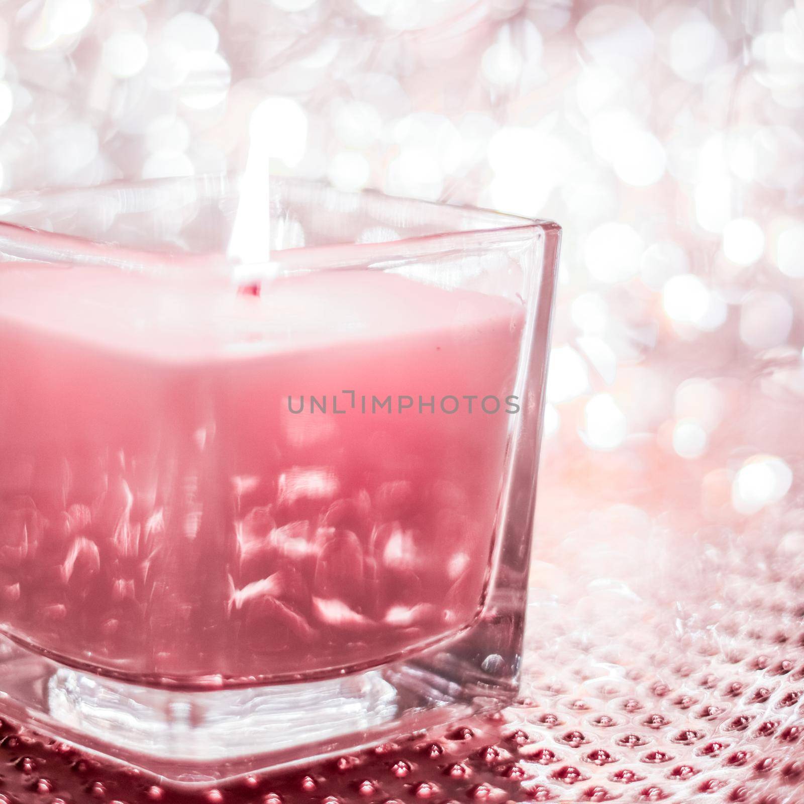 Festive decoration, branding and aromatherapy spa concept - Rose aromatic candle on Christmas and New Years glitter background, Valentines Day luxury home decor and holiday season brand design