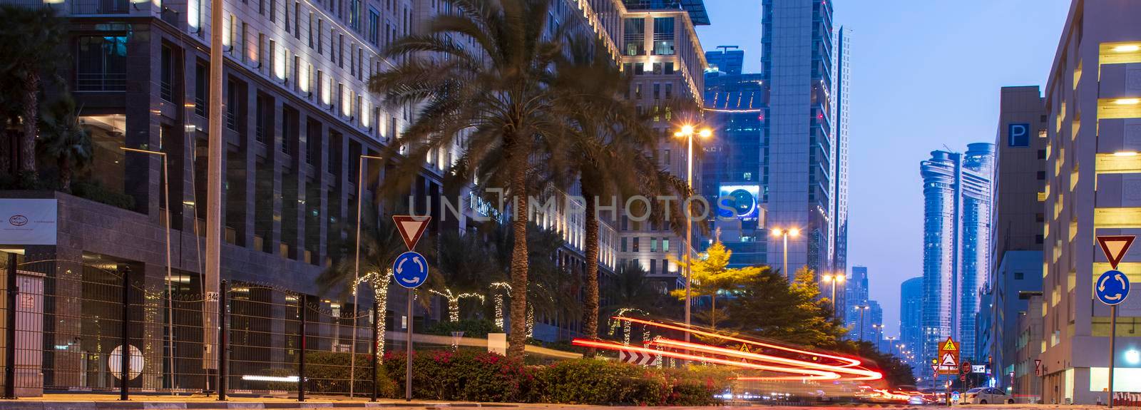 Light trails on Dubai Financial Center road. Dubai. by pazemin