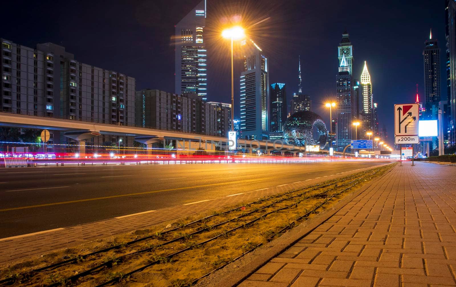 Main road of a United Arab Emirates, Shekh Zayed road. Shot taken in Dubai. Many of famous landmarks can be seen as well as metro station and Museum of future. Outdoors