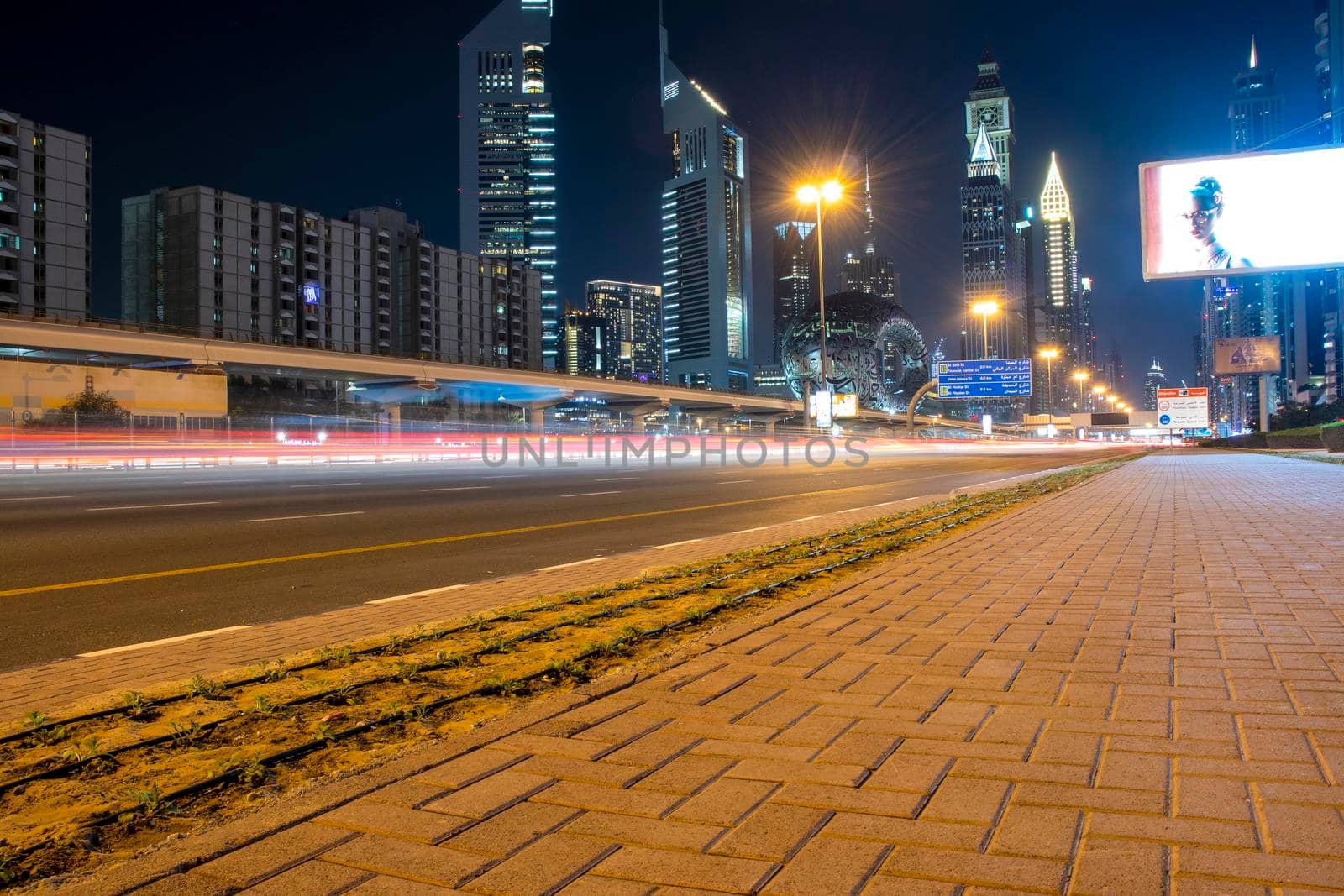 Main road of a United Arab Emirates, Shekh Zayed road. Shot taken in Dubai. Many of famous landmarks can be seen as well as metro station and Museum of future. Outdoors