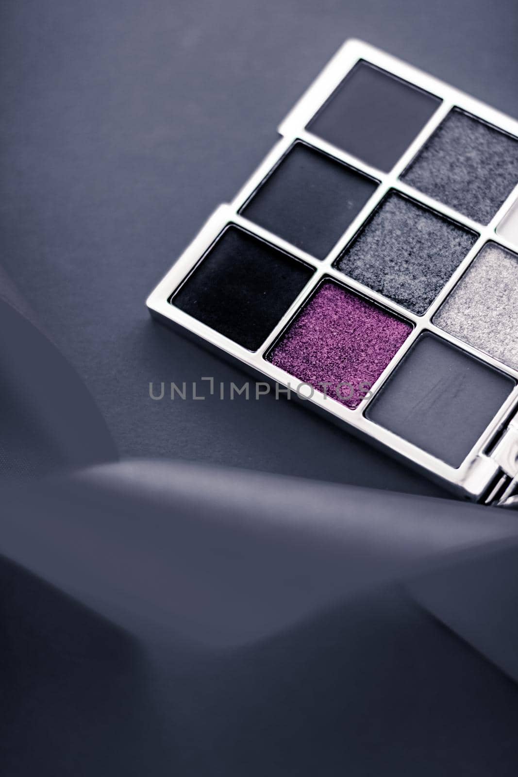 Cosmetic branding, mua and girly concept - Eyeshadow palette and make-up brush on graphite background, eye shadows cosmetics product for luxury beauty brand promotion and holiday fashion blog design