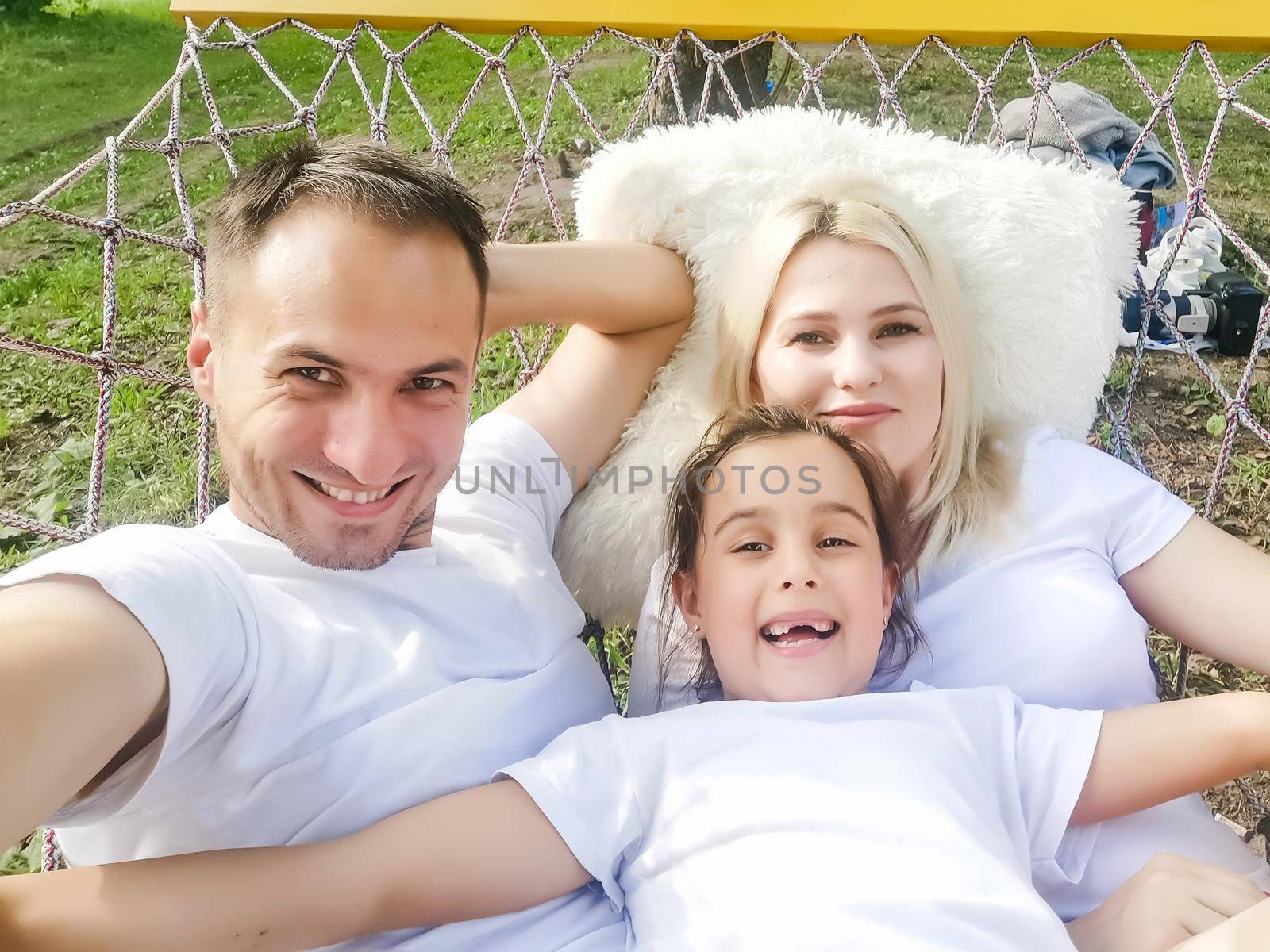 Portrait of family in a hammock
