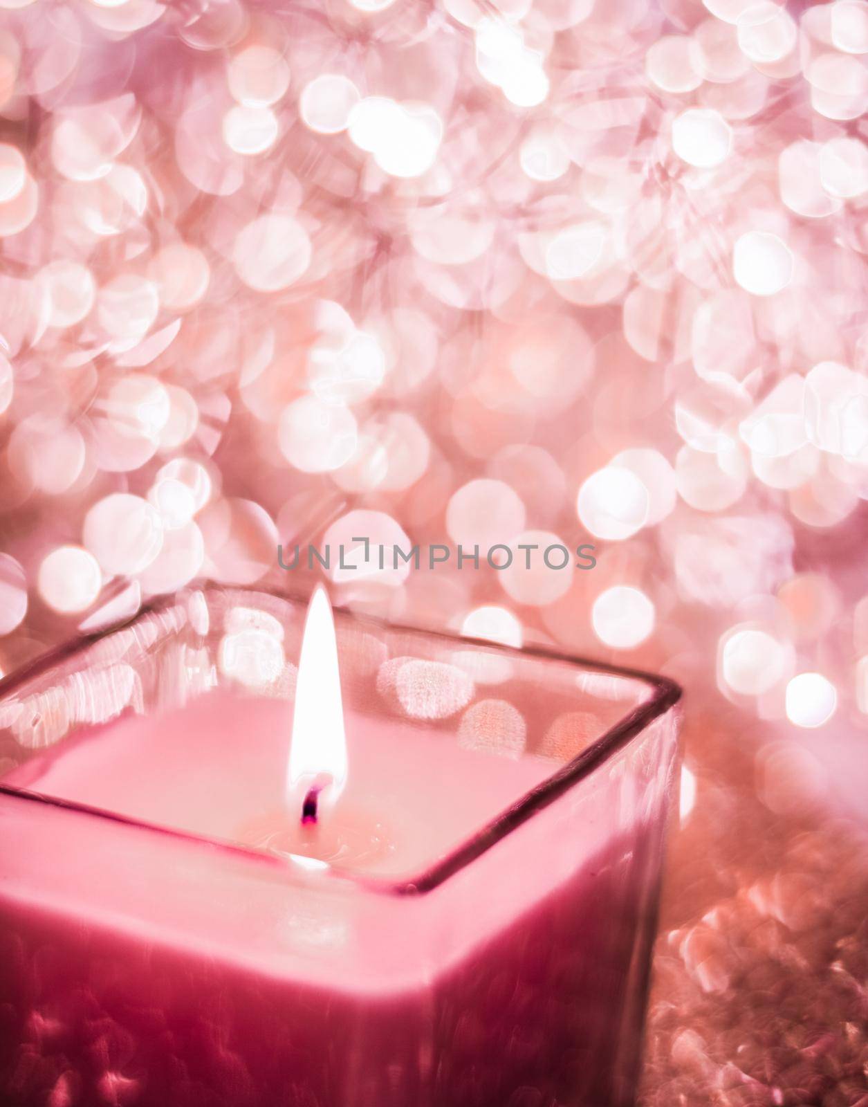 Festive decoration, branding and aromatherapy spa concept - Red aromatic candle on Christmas and New Years glitter background, Valentines Day luxury home decor and holiday season brand design