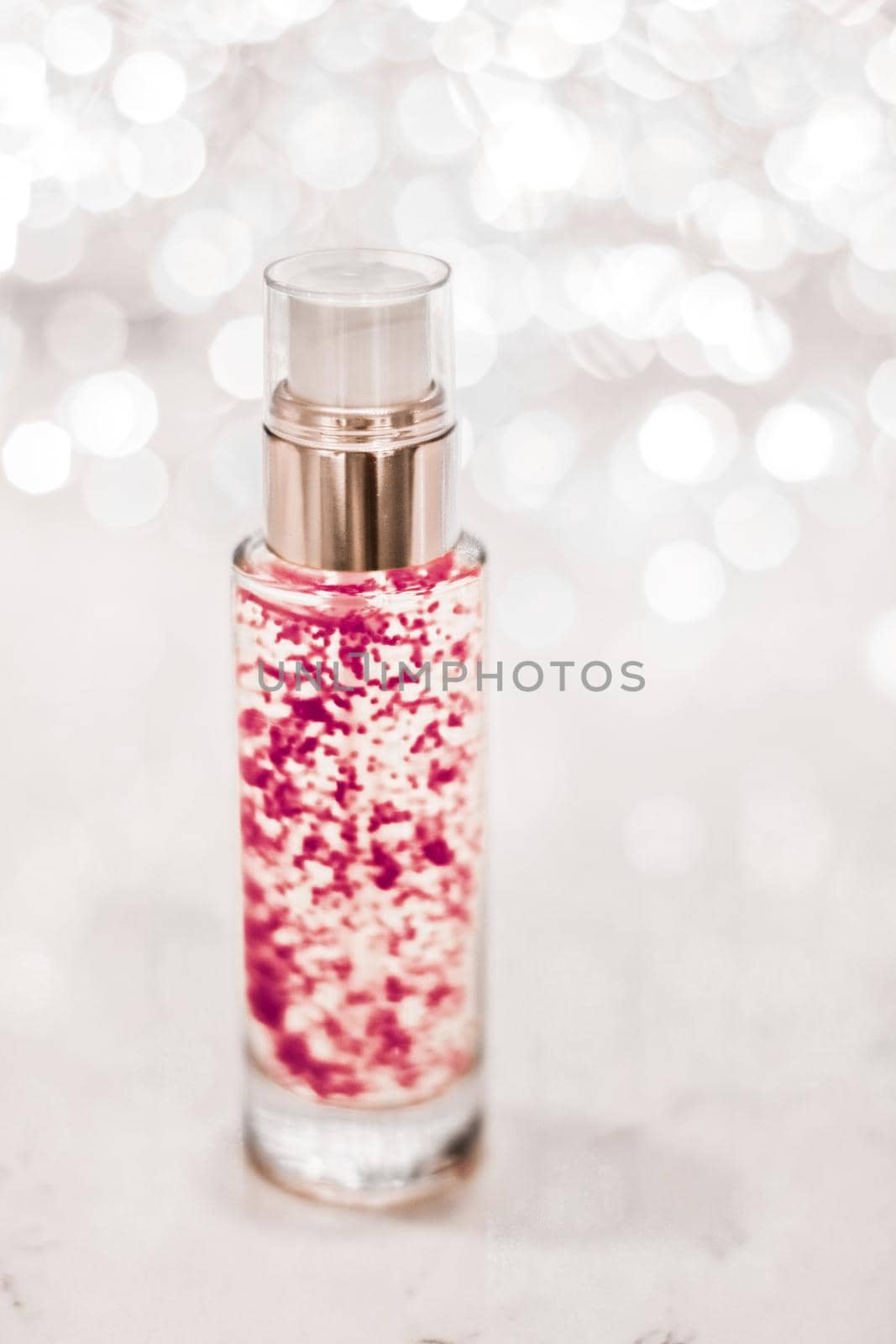 Cosmetic branding, blank label and glamour present concept - Holiday make-up base gel, serum emulsion, lotion bottle and silver glitter, luxury skin and body care cosmetics for beauty brand ads