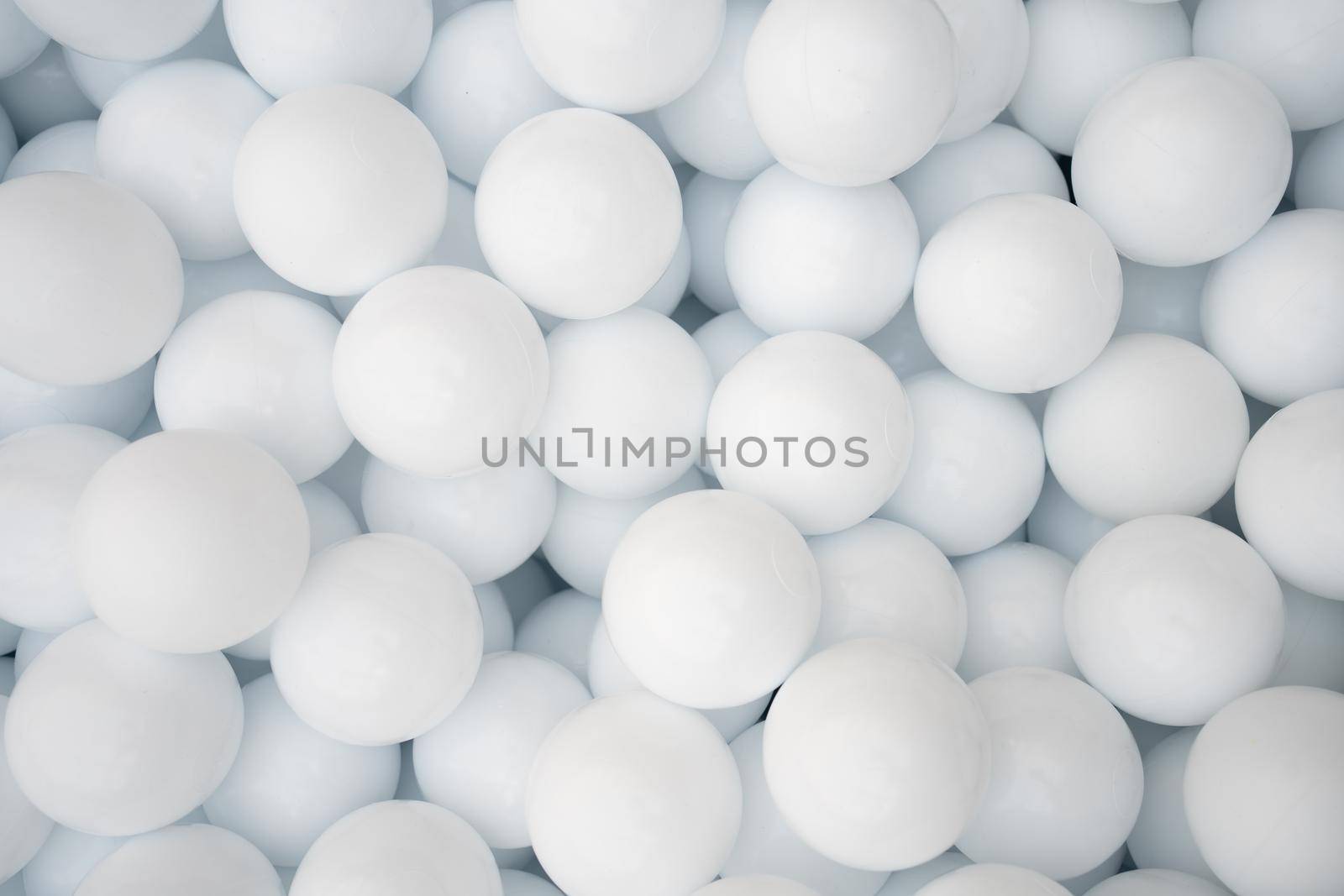 Many white plastic balls for dry pool in amusement park