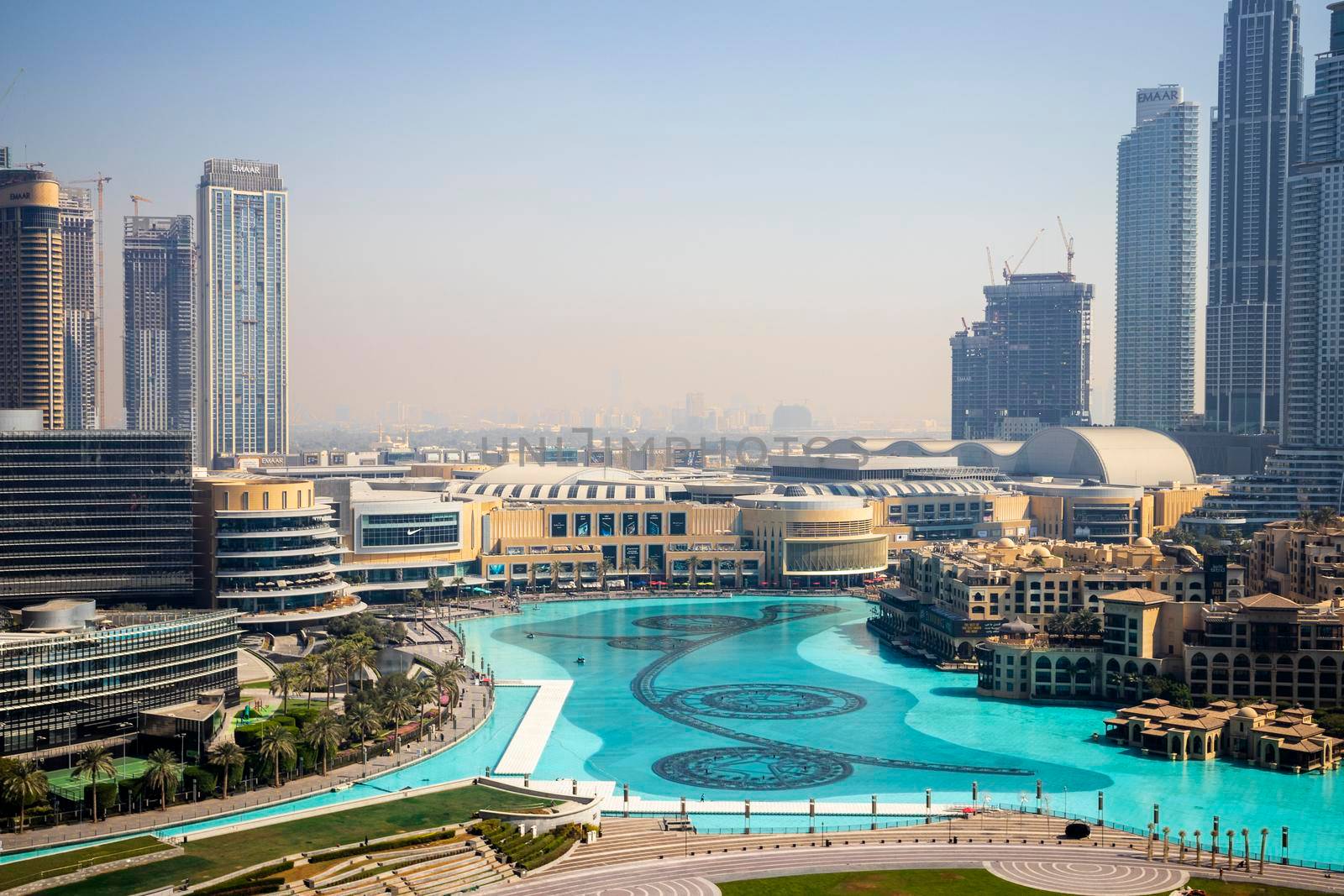 Dubai, UAE - 02.04.2021 Shot of largest shopping mall in the world - Dubai Mall. Also in the picture Burj Khalifa lake and Souq Al Bahar residencies