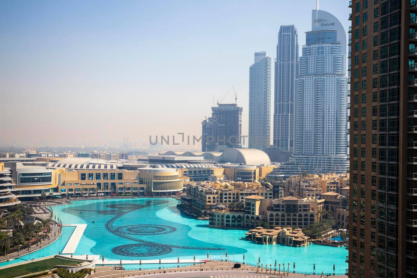Dubai, UAE - 02.04.2021 Shot of largest shopping mall in the world - Dubai Mall. Also in the picture Burj Khalifa lake and Souq Al Bahar residencies