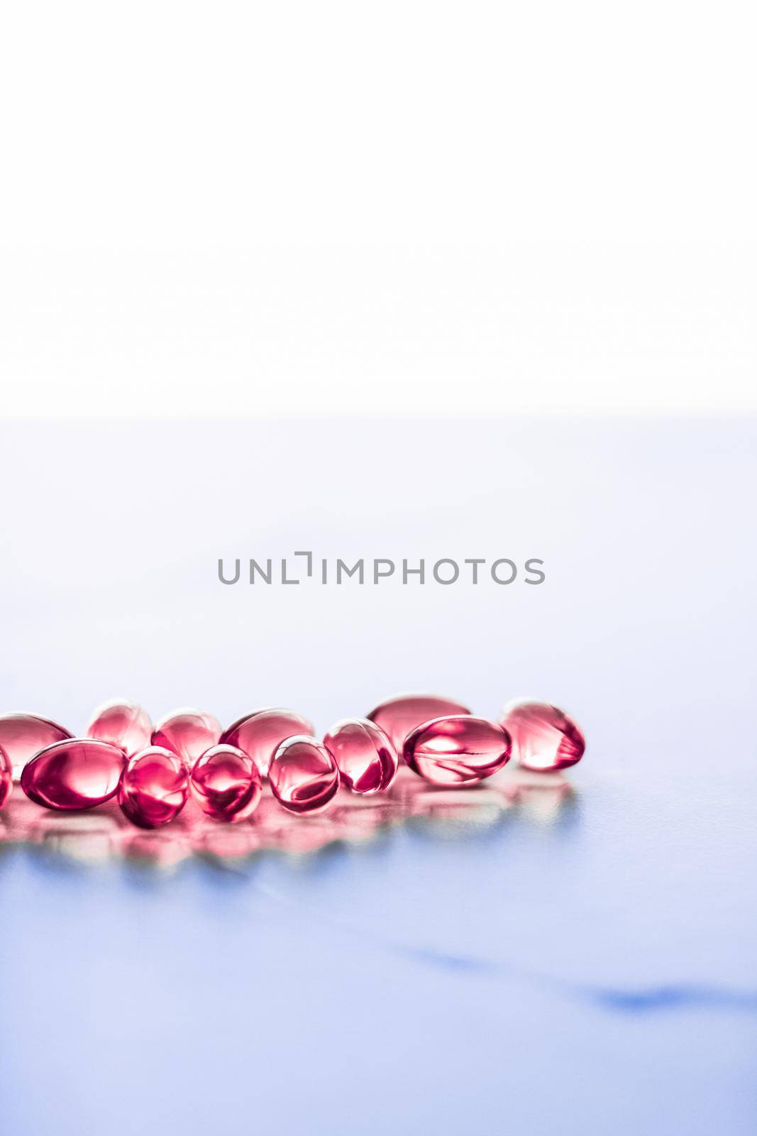 Red pills for healthy diet nutrition, supplements pill and probiotics capsules, healthcare and medicine as pharmacy and scientific research background by Anneleven