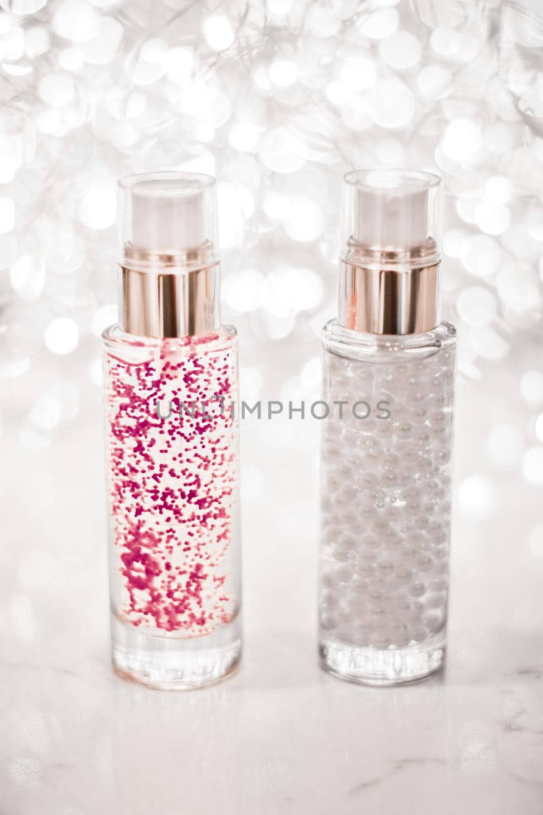 Holiday make-up base gel, serum emulsion, lotion bottle and silver glitter, luxury skin and body care cosmetics for beauty brand ads by Anneleven
