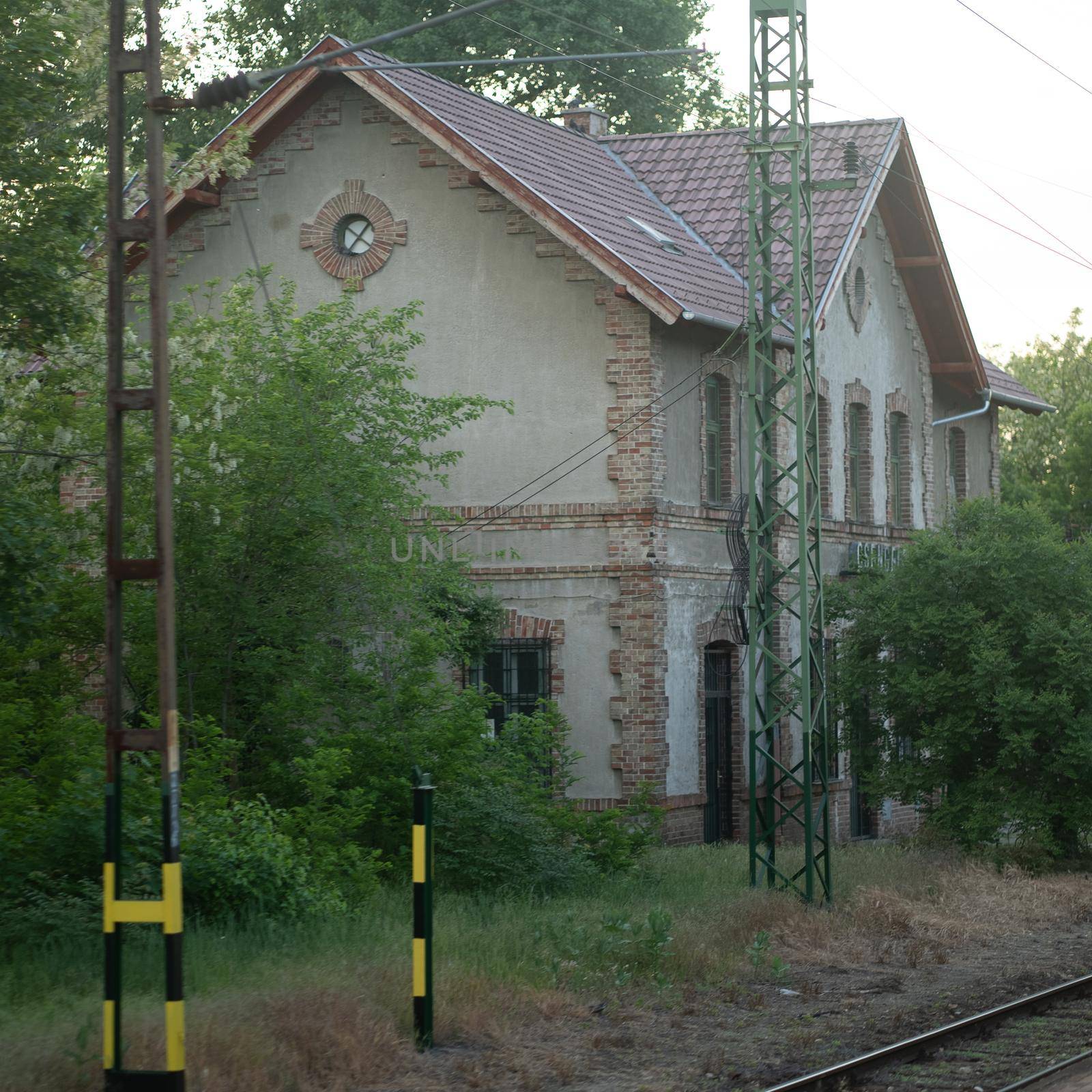 Old and scary railway station building with brick walls