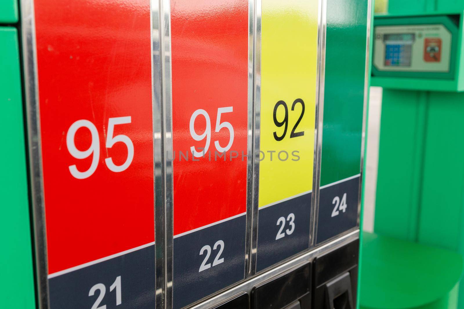 Colorfull fuel gasoline dispenser background. Close up of petroleum gasoline station service - oil refueling and refilling for car transportation concept