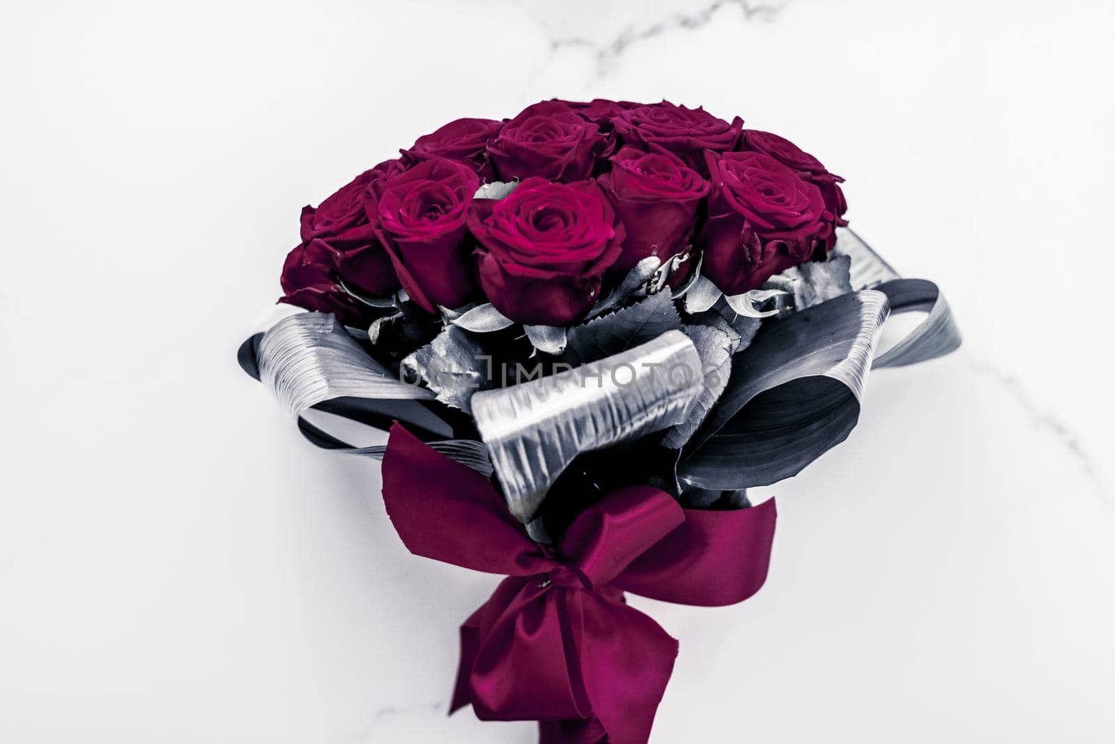 Gift for her, romantic relationship and floral design concept - Luxury bouquet of maroon roses on marble background, beautiful flowers as holiday love present on Valentines Day