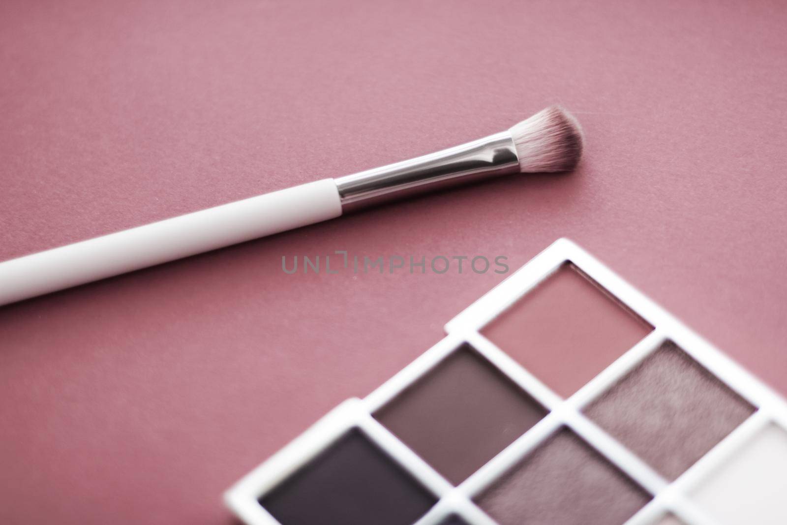Cosmetic branding, mua and girly concept - Eyeshadow palette and make-up brush on rouge background, eye shadows cosmetics product for luxury beauty brand promotion and holiday fashion blog design