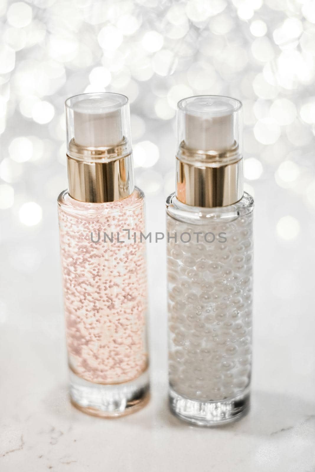 Holiday make-up base gel, serum emulsion, lotion bottle and silver glitter, luxury skin and body care cosmetics for beauty brand ads by Anneleven