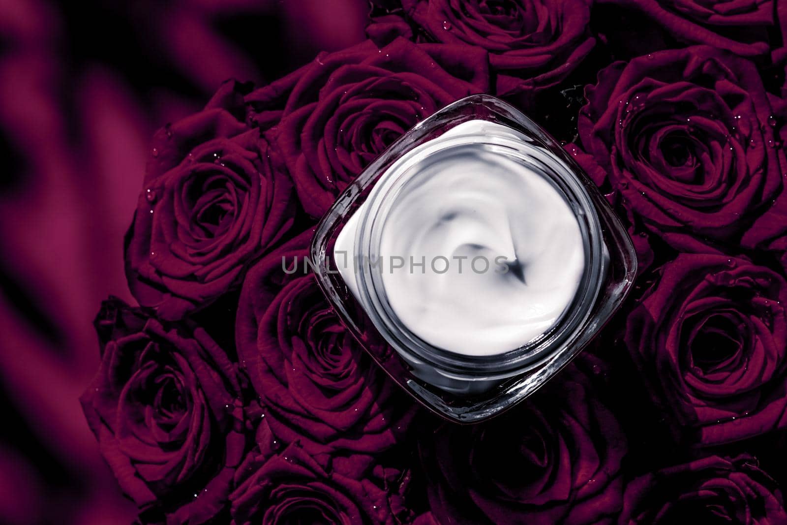 Luxe cosmetics, branding and anti-age concept - Face cream skin moisturizer and dark purple roses, luxury skincare cosmetic product on floral background as beauty brand holiday flatlay design