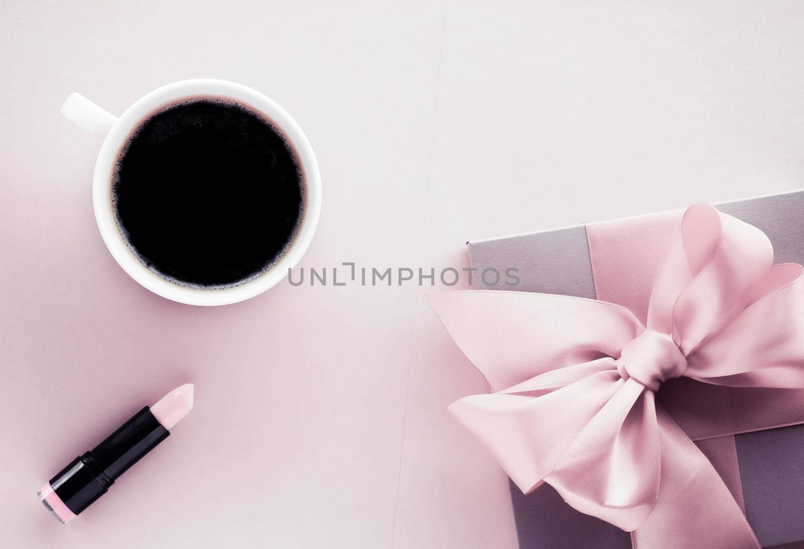 French chic, Valentines Day present and beauty drink concept - Luxury gift box and coffee cup on blush pink background, flatlay design for romantic holiday and birthday surprise